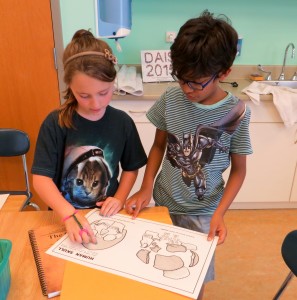 Arjun and Gabby discussing the skull and it's purpose.